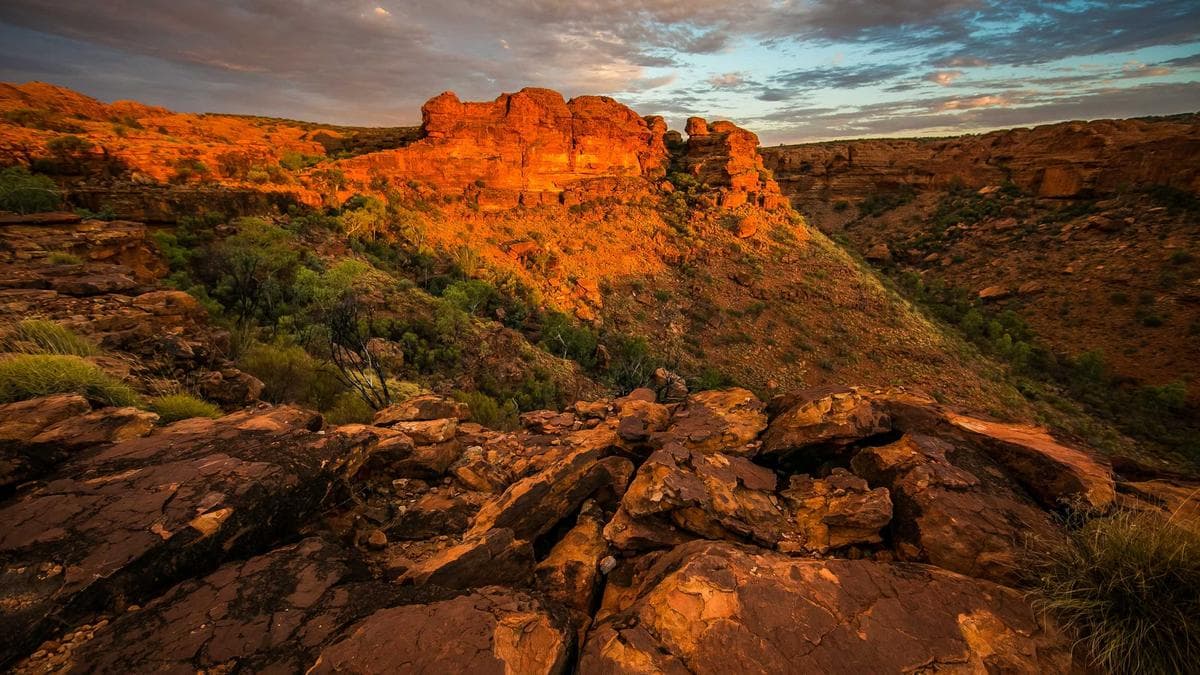 Sales rep writing down objection notes during a call